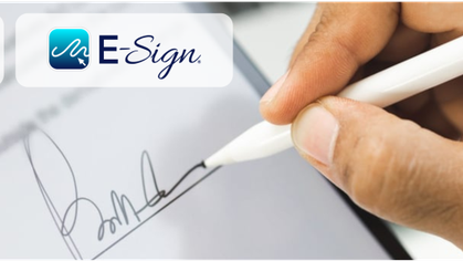 The E-Sign logo above a hand signing a document on a tablet with a stylus